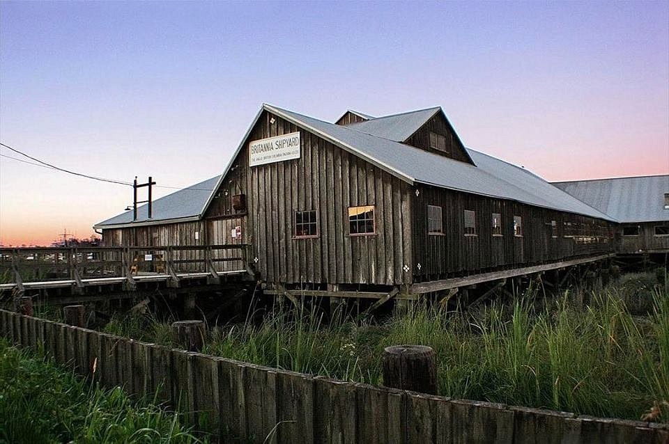 Historic shipyard buildings on the water